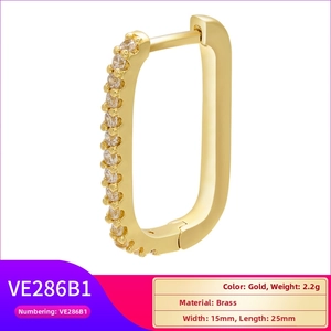 Detailed view of gold brass rectangular hoop earrings with cubic zirconia stones and sizing
