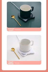 Detail view of cat-ear heated coaster set with ceramic mug and golden spoon in two colors