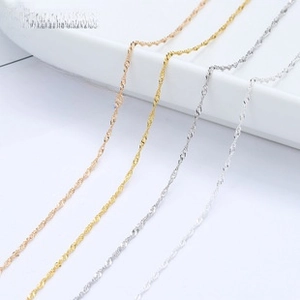 Detailed view of four multi-colored 925 sterling silver twisted water wave chain necklaces