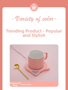 Detail view of pink constant temperature heating coaster set with ceramic mug and golden spoon