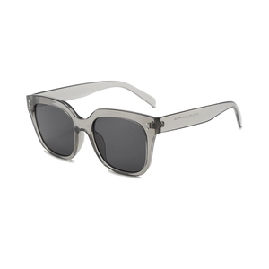 Modern grey translucent oversized sunglasses with dark lenses from a 45-degree angle