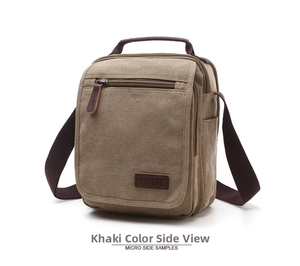 Detail view of khaki canvas messenger bag featuring multiple pockets and leather logo patch