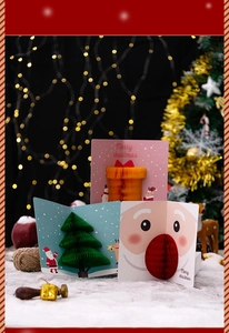 Three-dimensional Christmas cards featuring 3D gift box, tree, and Santa Claus designs
