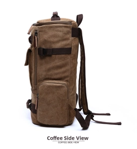 Side view of large coffee canvas travel backpack showing zippers and durable handles