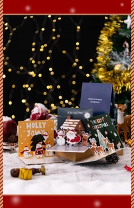 Detailed view of 3D pop-up Christmas cards featuring polar bear and reindeer designs