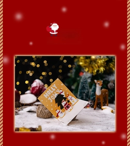 Macro detail of 3D Christmas pop-up card featuring polar bear and Holly Jolly text