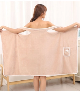 Back view of wearable apricot coral fleece bath towel dress with armholes and pocket