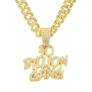 Detail of gold iced-out 30 Billion Gang pendant with full rhinestones on Cuban link chain