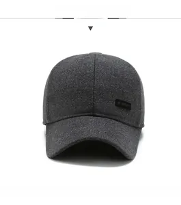 Detailed front view of dark grey wool blend baseball cap with sport logo embroidery