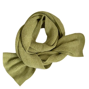 Soft light green ribbed knit scarf for women with warm thick texture in a coiled view