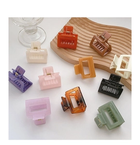 Set of 11 colorful square matte hair claw clips in various pastel and neutral shades