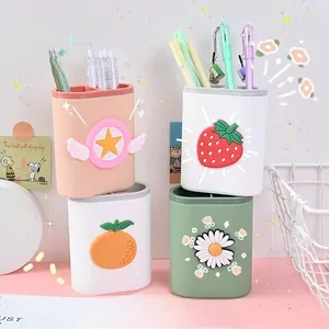 Set of four cute cartoon dual-grid PP pen holders with 3D soft rubber charms for desk storage