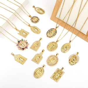Detailed close-up of Virgin Mary gold pendants with colorful zircon and micro-inlays