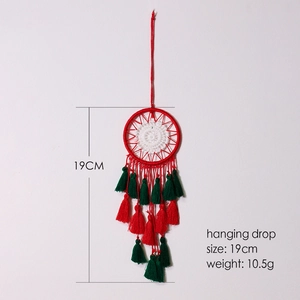 Detail showing 19cm Christmas dreamcatcher ornament with red and green tassels