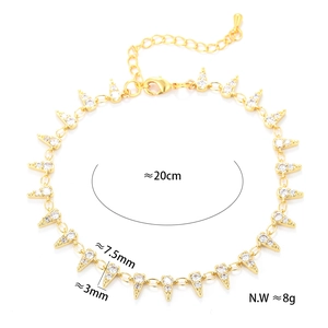 Detail of gold star link bracelet with zircon triangles and length dimensions