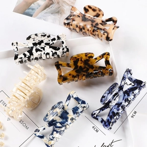 9CM acetate hair claws in various patterns like tortoiseshell and marble patterns