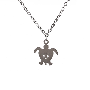 Polished stainless steel turtle pendant necklace with hollow design on white background