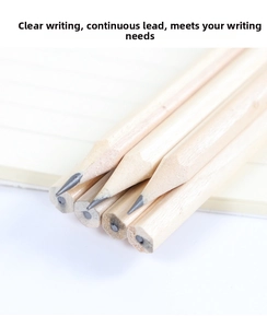 Macro detail of hexagonal HB raw wood pencils with natural grain on lined notebook