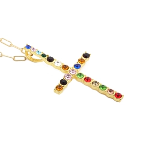 Golden hip hop cross necklace with colorful rhinestones on a stylish paperclip chain link