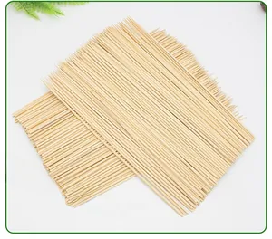 Detail view of stacked sharp carbonized bamboo skewers for BBQ and grilling