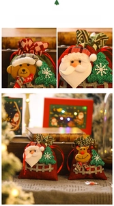 Detail of Christmas burlap drawstring gift bags with 3D Santa, bear, and reindeer embroidery