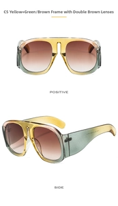Detail view of oversized yellow-green gradient sunglasses with brown lenses and CE mark
