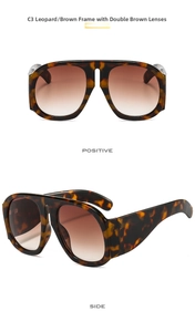 Macro view of leopard print frames and brown gradient lenses of the sunglasses