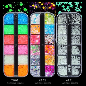 Luminous nail art sequin set with stars and moon shapes in a 12-grid organizer box