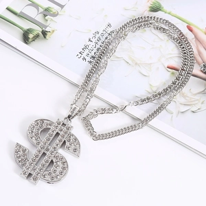 Close-up of hip-hop silver dollar sign necklace with cubic zirconia on Cuban chain