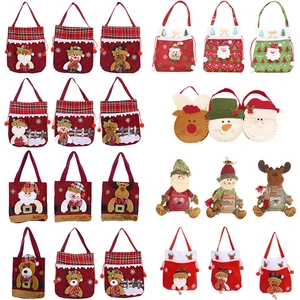 Cartoon Christmas gift bags featuring Santa, snowman and reindeer designs in bulk