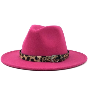 Detail of hot pink fedora wool hat featuring a leopard print belt and silver buckle