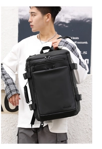 Detail view of waterproof business backpack with matte metal zipper on the black fabric