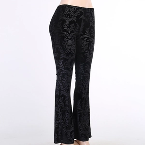 Detail shot of black gothic damask velvet texture on flared trousers for women