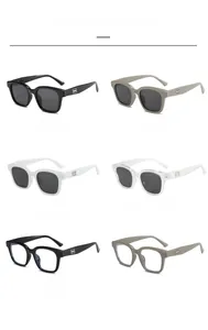 Square sunglasses color selection featuring diverse frames and metallic logo detail