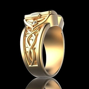 Macro view of vintage 18K gold-plated flip-top ring with floral engraving and zircon