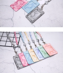Detailed macro view of marble pattern PU leather ID card holders in multiple vibrant colors