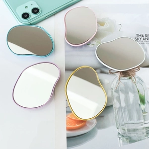 Foldable air cushion phone grip mirrors with colorful irregular edges in five vibrant colors