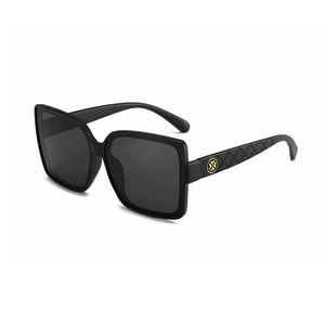 Classic black square oversized sunglasses with gold quilted temples and logo detail