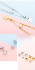 Détail du collier cœur en acier inoxydable avec gravure Love et boucles d'oreilles clous
