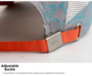 Detail of adjustable orange strap and silver metal buckle on breathable mesh cap