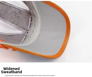 Detail of kid's mesh cap showing 3cm widened sweatband and orange contrast edge
