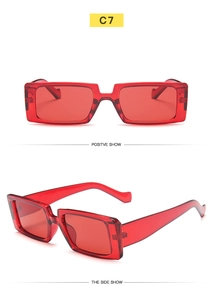 Front and side views of red rectangular sunglasses with transparent frames