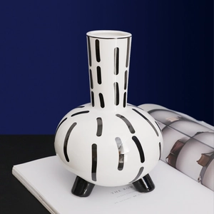 Nordic minimalist ceramic vase with black stripes and tripod feet for art decor
