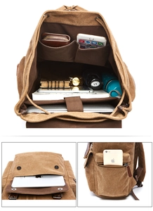 Detail view of large capacity canvas backpack interior compartments and storage space