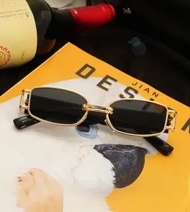 Detail view of fashion irregular vintage sunglasses with golden metal frame and model number