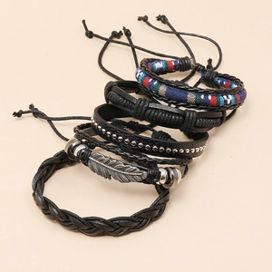 Handmade multilayer leather bracelet set with feather charm and braided rope detail