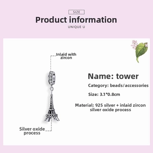 Detail view of 925 silver Eiffel Tower charm showing size 3.1x0.8cm and zircon inlay