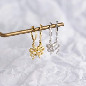 Elegant gold and silver S925 sterling silver hoop earrings with textured snake pendants
