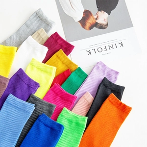 Colorful cotton rib-knit crew socks for women in various solid dopamine colors