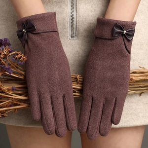 Plum purple warm winter gloves with elegant leather bow detail and soft thermal fabric